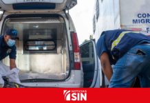 Hallazgo de cadáver en camión de la DGM en Santo Domingo
