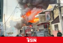Ocho unidades de bomberos combaten incendio en Pueblo Nuevo, Santiago