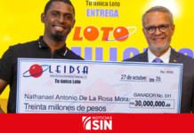 Leidsa entrega 30 millones a taxista ganador del Loto